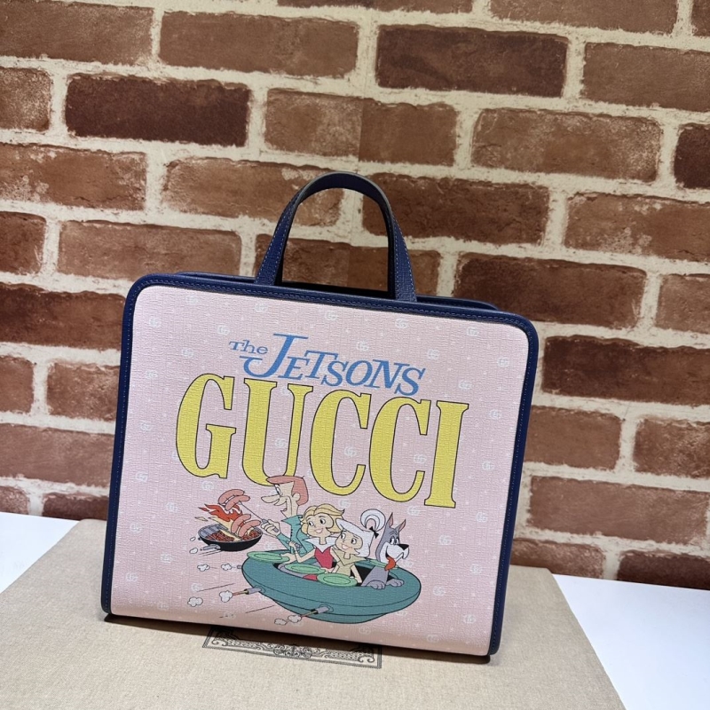 G*u*i shopping bags